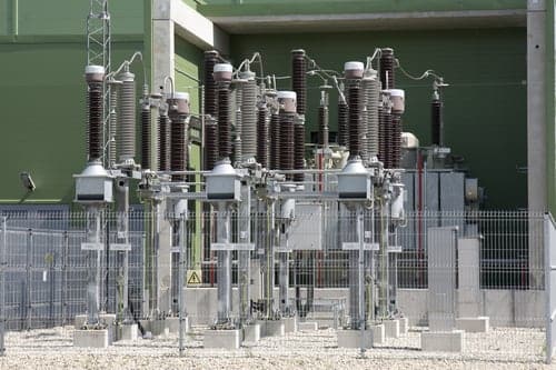 High-voltage utility switchgear at an electrical substation feeding a residential distribution network