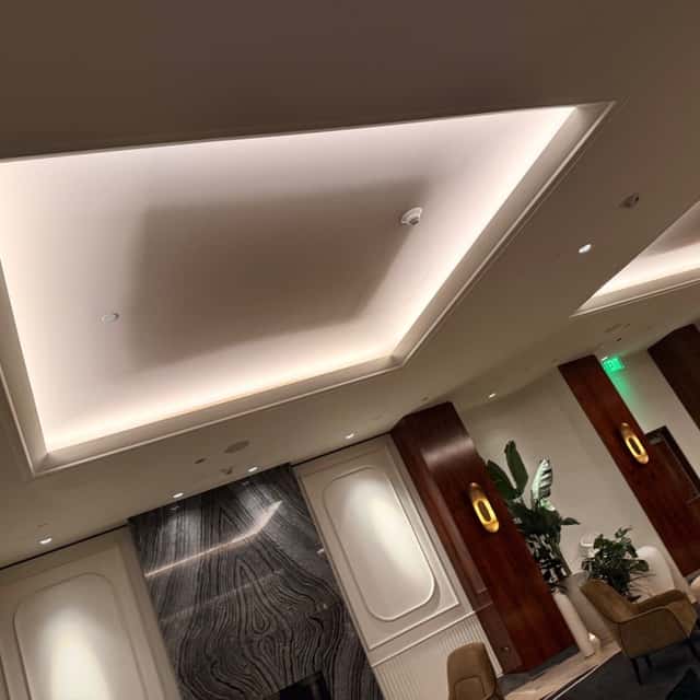 Illuminated ceiling cove with warm LED strip lighting in a lobby — Nebady's Electric Corporation, Palmdale, CA