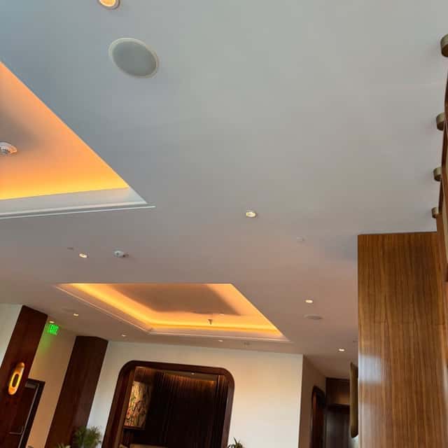 Recessed ceiling lights and cove lighting along a commercial corridor — Nebady's Electric Corporation, Palmdale, CA