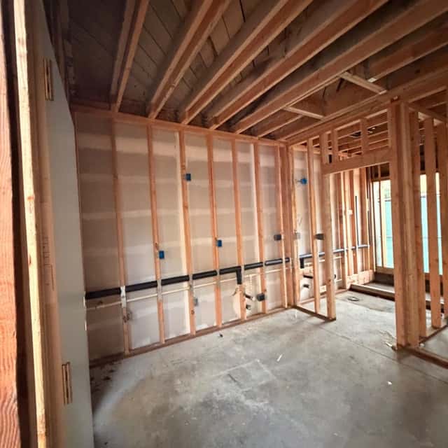 Framed interior with electrical rough-in and conduit runs — Nebady's Electric Corporation, Palmdale, CA